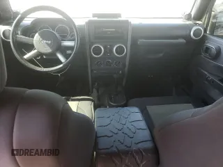 2008 Jeep Wrangler Unlimited Sahara with VIN 1J4GA59158L550576, listed as a Copart auction lot 53095565 with 208,434 mi miles and Salvage Title. Bid and sale history available at DreamBid. Image 8.