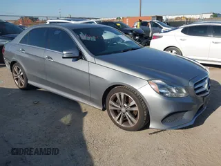 2015 Mercedes-Benz E 350 Sport with VIN WDDHF5KB4FB092696, listed as a IAAI auction lot 41913751 with 154,063 mi miles and . Bid and sale history available at DreamBid. Image 1.