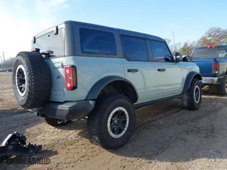 2023 Ford Bronco with VIN 1FMEE5DP7PLB86734, listed as a IAAI auction lot 41396463 with 12,795 mi miles. Bid and sale history available at carsss.com. Image 4.