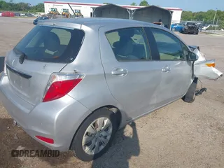 2013 Toyota Yaris L with VIN JTDKTUD30DD548977, listed as a IAAI auction lot 42187750 with 213,377 mi miles and . Bid and sale history available at DreamBid. Image 4.