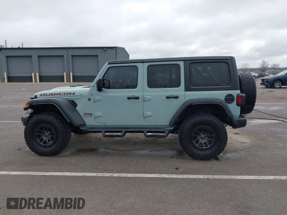2023 Jeep Wrangler Rubicon with VIN 1C4JJXFG7PW654564, listed as a IAAI auction lot 41833534 with 22,277 mi miles and . Bid and sale history available at DreamBid. Image 14.