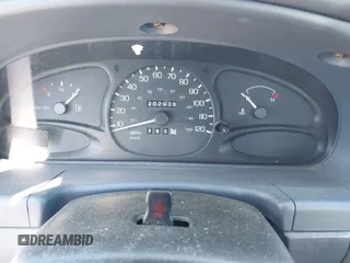 1999 Ford Escort LX with VIN 1FAFP10P1XW236632, listed as a IAAI auction lot 42325892 with 202,939 mi miles and . Bid and sale history available at DreamBid. Image 7.