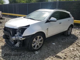 2015 Cadillac SRX Performance Collection with VIN 3GYFNFE30FS581240, listed as a Copart auction lot 54409175 with 89,957 mi miles and Salvage title. Bid and sale history available at DreamBid. Image 1.