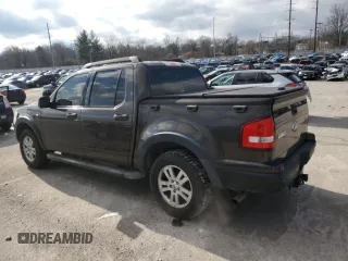 2007 Ford Explorer Sport Trac XLT with VIN 1FMEU51827UB11711, listed as a Copart auction lot 86621944 with 131,231 mi miles and Salvage title. Bid and sale history available at DreamBid. Image 2.