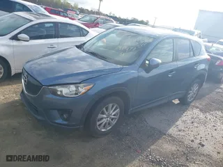 2015 Mazda CX-5 Touring with VIN JM3KE4CY8F0539341, listed as a IAAI auction lot 41937474 with 114,393 mi miles. Bid and sale history available at carsss.com. Image 17.