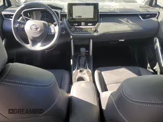 2023 Toyota Corolla Cross XLE z VIN 7MUDAAAG9PV055009, wystawiony jako Copart lot #53021105 z przebiegiem 14 766 mil mil oraz Szkody całkowita. Historia ofert i sprzedaży dostępna na DreamBid. Obrazek 8.