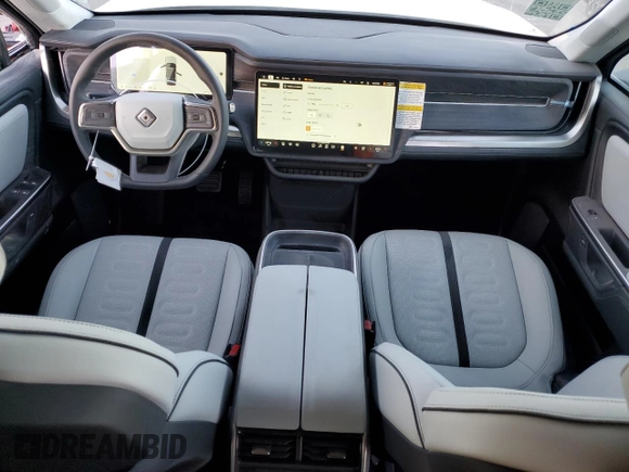 2025 Rivian R1S Adventure with VIN 7PDSGBBA0SN051096, listed as a Copart auction lot 87441054 with 30 mi miles and Salvage Title. Bid and sale history available at carsss.com. Image 8.