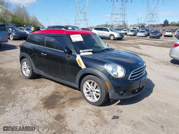 2014 MINI Cooper Paceman with VIN WMWSS1C51EWN94518, listed as a IAAI auction lot 41986247 with 175,940 mi miles. Bid and sale history available at carsss.com. Image 1.