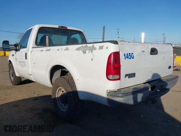 2002 Ford Super Duty F-250 XL with VIN 1FTNF20L72EB79640, listed as a IAAI auction lot 41667865 with 153,384 mi miles. Bid and sale history available at carsss.com. Image 3.