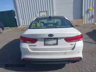 2016 Kia Optima EX with VIN 5XXGU4L32GG070138, listed as a IAAI auction lot 42138810 with 131,040 mi miles. Bid and sale history available at carsss.com. Image 16.