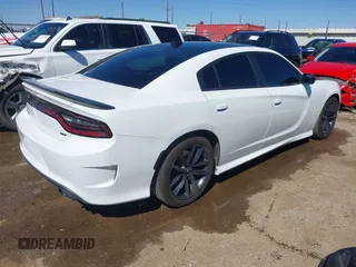 2021 Dodge Charger GT with VIN 2C3CDXHG5MH537741, listed as a IAAI auction lot 41728550 with 53,990 mi miles and . Bid and sale history available at DreamBid. Image 4.