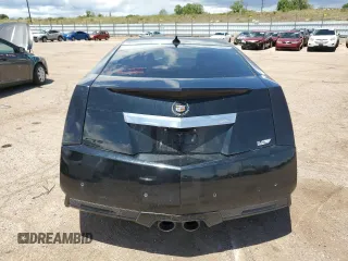 2011 Cadillac CTS-V z VIN 1G6DV1EP9B0112705, wystawiony jako Copart lot #59093154 z przebiegiem 114 181 mil mil oraz Szkody całkowita. Historia ofert i sprzedaży dostępna na DreamBid. Obrazek 6.