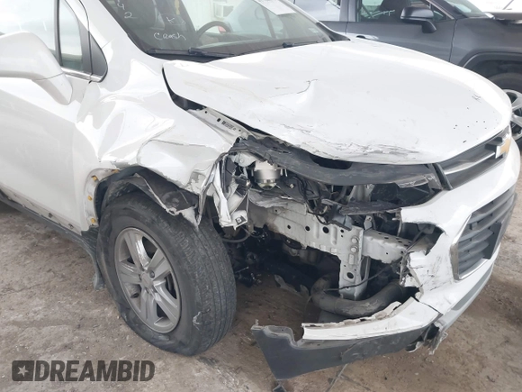2020 Chevrolet Trax LT with VIN KL7CJLSBXLB010793, listed as a IAAI auction lot 41704879 with 124,915 mi miles and . Bid and sale history available at DreamBid. Image 6.