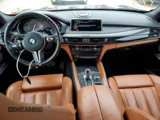2016 BMW X5 M z VIN 5YMKT6C54G0R79260, wystawiony jako Copart lot #71881962 z przebiegiem 61 979 mil mil oraz . Historia ofert i sprzedaży dostępna na DreamBid. Obrazek 8.