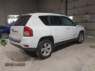 2012 Jeep Compass Latitude with VIN 1C4NJDEB0CD676725, listed as a IAAI auction lot 41948874 with 143,833 mi miles. Bid and sale history available at carsss.com. Image 4.