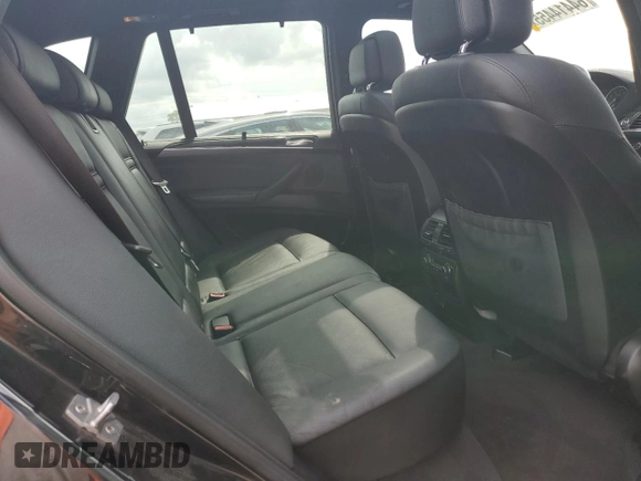 2012 BMW X5 50i with VIN 5UXZV8C51CL424965, listed as a Copart auction lot 64414455 with 121,894 mi miles and Clean title. Bid and sale history available at DreamBid. Image 11.