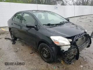 2012 Toyota Yaris with VIN JTDBT4K33CL035567, listed as a Copart auction lot 51837505 with 233,895 mi miles and Salvage Title. Bid and sale history available at DreamBid. Image 10.