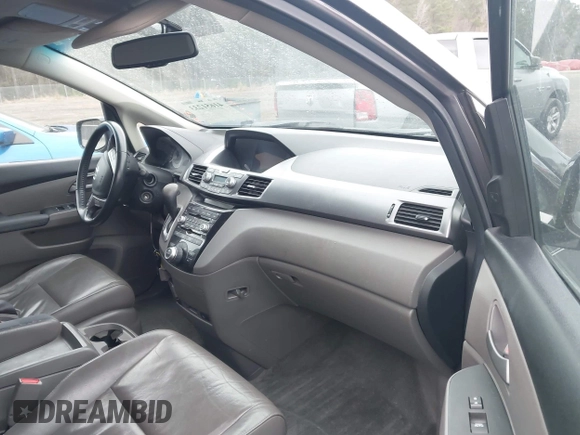 2012 Honda Odyssey Touring with VIN 5FNRL5H99CB071010, listed as a IAAI auction lot 41651233 with 186,913 mi miles. Bid and sale history available at carsss.com. Image 5.