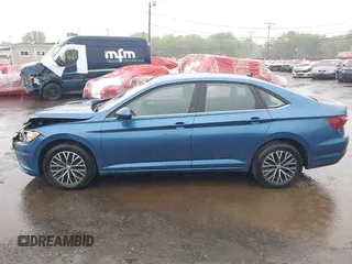 2021 Volkswagen Jetta S with VIN 3VWC57BU9MM054792, listed as a IAAI auction lot 42244993 with 12,494 mi miles and . Bid and sale history available at DreamBid. Image 14.