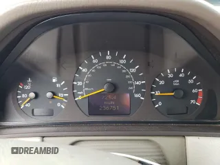 2000 Mercedes-Benz E-Class with VIN WDBJF65J5YB068297, listed as a Copart auction lot 69199004 with 236,751 mi miles and Salvage Title. Bid and sale history available at carsss.com. Image 9.