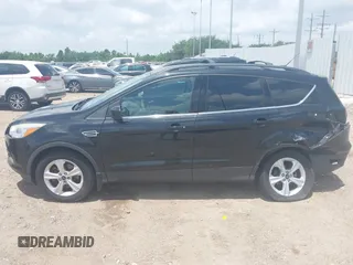 2013 Ford Escape SE with VIN 1FMCU9GX0DUC42483, listed as a IAAI auction lot 42549857 with 138,028 mi miles and . Bid and sale history available at DreamBid. Image 14.
