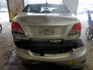 2015 Hyundai Accent GLS with VIN KMHCT4AE2FU873090, listed as a Copart auction lot 70168202 with 112,352 mi miles. Bid and sale history available at carsss.com. Image 6.