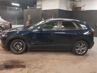 2024 Mazda CX-30 S Preferred z VIN 3MVDMBCM9RM700673, wystawiony jako IAAI lot #42417844 z przebiegiem 7 385 mil mil oraz . Historia ofert i sprzedaży dostępna na DreamBid. Obrazek 14.