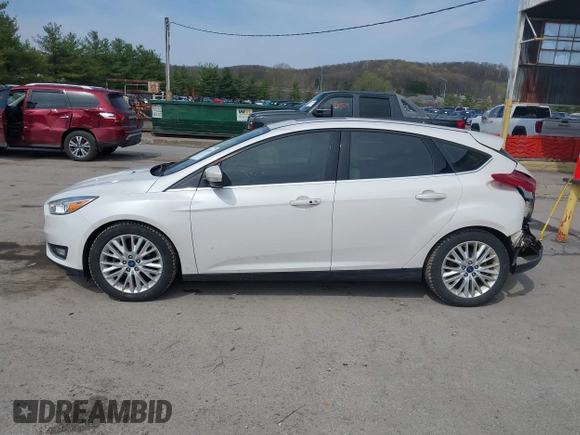 2017 Ford Focus Titanium with VIN 1FADP3N24HL331009, listed as a IAAI auction lot 42029193 with 82,068 mi miles and . Bid and sale history available at carsss.com. Image 14.
