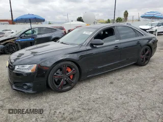 2015 Audi S8 with VIN WAUK2AFD6FN005005, listed as a Copart auction lot 72074884 with 74,335 mi miles and Salvage Title. Bid and sale history available at carsss.com. Image 1.