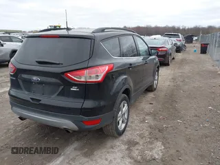2016 Ford Escape SE with VIN 1FMCU9GX0GUC86844, listed as a IAAI auction lot 42046081 with 95,319 mi miles. Bid and sale history available at carsss.com. Image 4.
