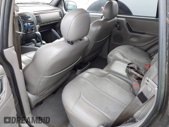 2000 Jeep Grand Cherokee Laredo with VIN 1J4GW48N2YC187623, listed as a IAAI auction lot 41311495 with 121,831 mi miles and . Bid and sale history available at DreamBid. Image 8.