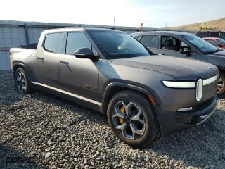 2023 Rivian R1T Adventure with VIN 7FCTGAAA5PN023738, listed as a Copart auction lot 63131724 with 141 mi miles and Salvage Title. Bid and sale history available at carsss.com. Image 4.