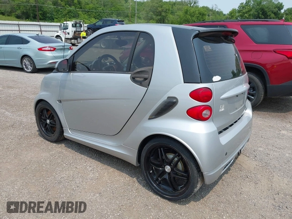 2009 Smart fortwo Pure with VIN WMEEJ31X39K276062, listed as a IAAI auction lot 42383073 with 108,190 mi miles and . Bid and sale history available at DreamBid. Image 3.