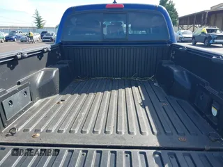 2015 Toyota Tacoma with VIN 3TMLU4ENXFM177755, listed as a IAAI auction lot 41867145 with 123,551 mi miles and . Bid and sale history available at DreamBid. Image 17.