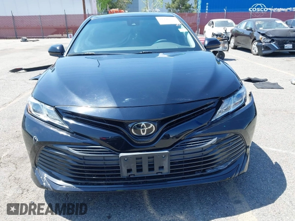2020 Toyota Camry LE with VIN 4T1C11AKXLU955851, listed as a IAAI auction lot 41996827 with 59,008 mi miles and . Bid and sale history available at carsss.com. Image 6.
