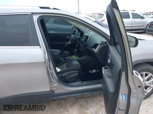 2018 Jeep Cherokee Latitude with VIN 1C4PJLCX4JD559096, listed as a IAAI auction lot 41925282 with 127,488 mi miles and . Bid and sale history available at DreamBid. Image 5.