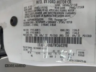 2007 Ford Focus S z VIN 1FAFP34N87W360398, wystawiony jako IAAI lot #42395300 z przebiegiem 96 220 mil mil oraz . Historia ofert i sprzedaży dostępna na DreamBid. Obrazek 9.