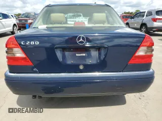 1996 Mercedes-Benz C with VIN WDBHA28E3TF392659, listed as a Copart auction lot 75169934 with Not Provided miles and Salvage Title. Bid and sale history available at carsss.com. Image 6.