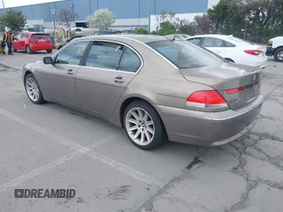 2004 BMW 7 Series 745Li with VIN WBAGN63494DS45716, listed as a IAAI auction lot 41906522 with 127,292 mi miles. Bid and sale history available at carsss.com. Image 3.