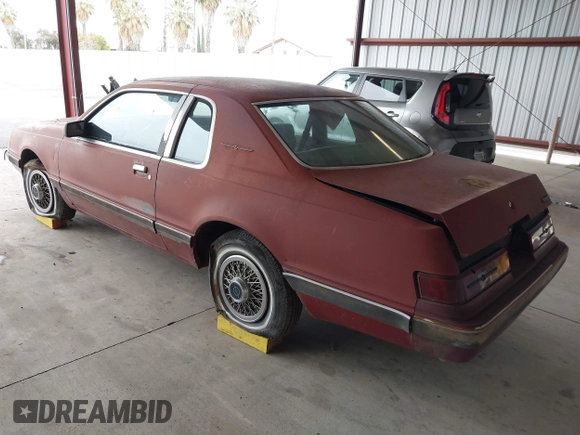 1984 Ford Thunderbird with VIN 1FABP4630EA111572, listed as a IAAI auction lot 41569309 with 7,919 mi miles and . Bid and sale history available at DreamBid. Image 3.