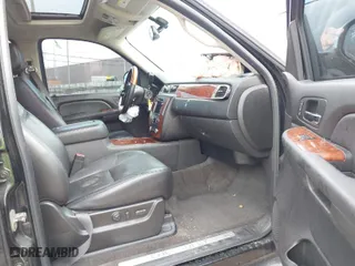 2009 Chevrolet Suburban LTZ with VIN 1GNFK36319R241721, listed as a IAAI auction lot 41822296 with 146,069 mi miles. Bid and sale history available at carsss.com. Image 5.
