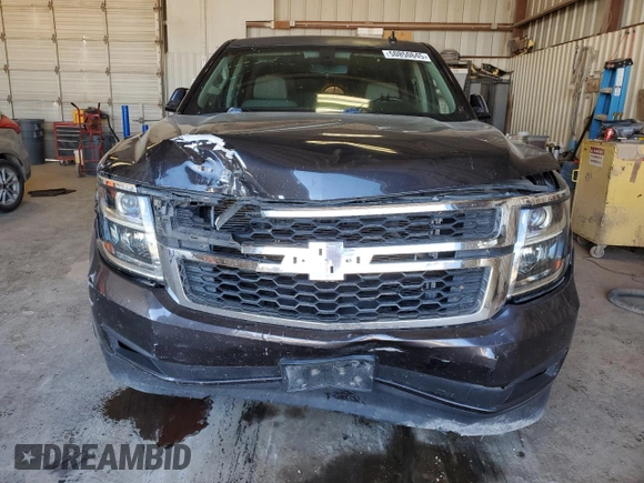 2015 Chevrolet Tahoe LS with VIN 1GNSCAKC5FR501801, listed as a Copart auction lot 50850645 with 112,896 mi miles and Salvage title. Bid and sale history available at DreamBid. Image 5.