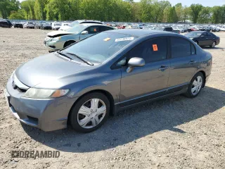 2009 Honda Civic LX z VIN 19XFA16569E035436, wystawiony jako Copart lot #52230975 z przebiegiem 129 228 mil mil oraz Szkody całkowita. Historia ofert i sprzedaży dostępna na DreamBid. Obrazek 1.