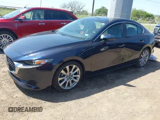2021 Mazda 3 Select with VIN JM1BPABL7M1314973, listed as a IAAI auction lot 42011342 with 53,785 mi miles and . Bid and sale history available at DreamBid. Image 2.