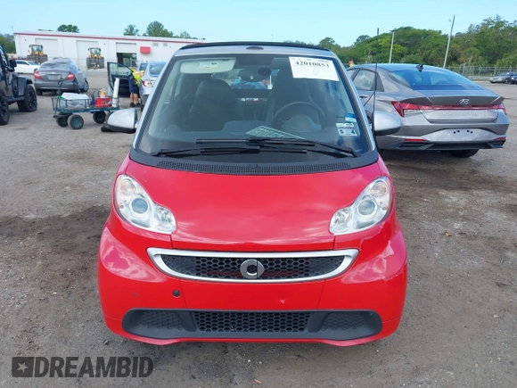 2013 Smart fortwo Passion z VIN WMEEK3BA5DK591221, wystawiony jako IAAI lot #42010853 z przebiegiem 101 953 mil mil oraz . Historia ofert i sprzedaży dostępna na DreamBid. Obrazek 12.