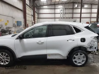 2022 Ford Escape SE z VIN 1FMCU9G61NUA42771, wystawiony jako IAAI lot #41746954 z przebiegiem 49 911 mil mil oraz . Historia ofert i sprzedaży dostępna na DreamBid. Obrazek 15.