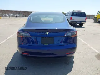 2023 Tesla Model 3 z VIN 5YJ3E1EA6PF547209, wystawiony jako IAAI lot #42511077 z przebiegiem 6 125 mil mil oraz . Historia ofert i sprzedaży dostępna na DreamBid. Obrazek 16.