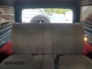 1991 Ford Bronco Custom with VIN 1FMEU15H0MLA44126, listed as a Copart auction lot 82401324 with 79,550 mi miles and Salvage Title. Bid and sale history available at carsss.com. Image 10.