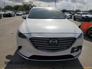 2021 Mazda CX-9 Grand Touring with VIN JM3TCADY2M0519977, listed as a Copart auction lot 76137724 with 31,306 mi miles and Salvage title. Bid and sale history available at DreamBid. Image 5.