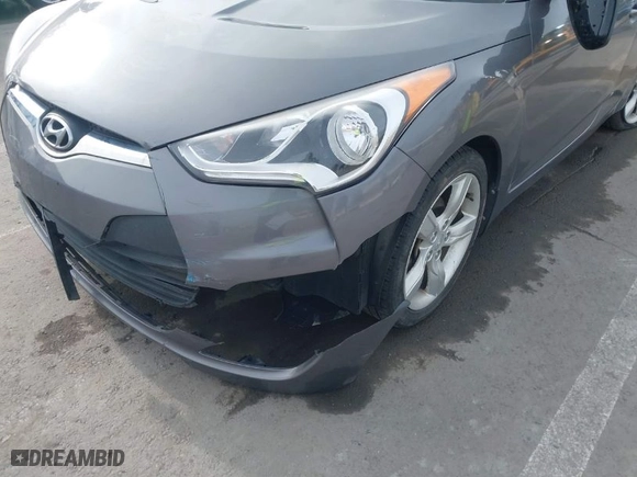 2013 Hyundai Veloster w/Black Int with VIN KMHTC6AD3DU132477, listed as a IAAI auction lot 41612401 with 132,217 mi miles. Bid and sale history available at carsss.com. Image 12.